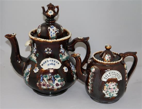 Two Meescham pottery teapots and covers, 32.5cm and 20cm